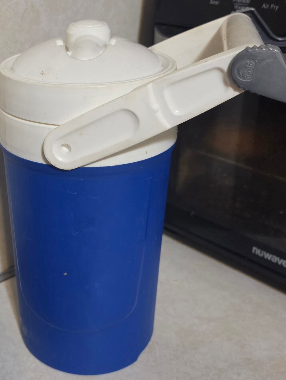 Blue Insulated Plastic Water Pitcher with White Lid and Handle
